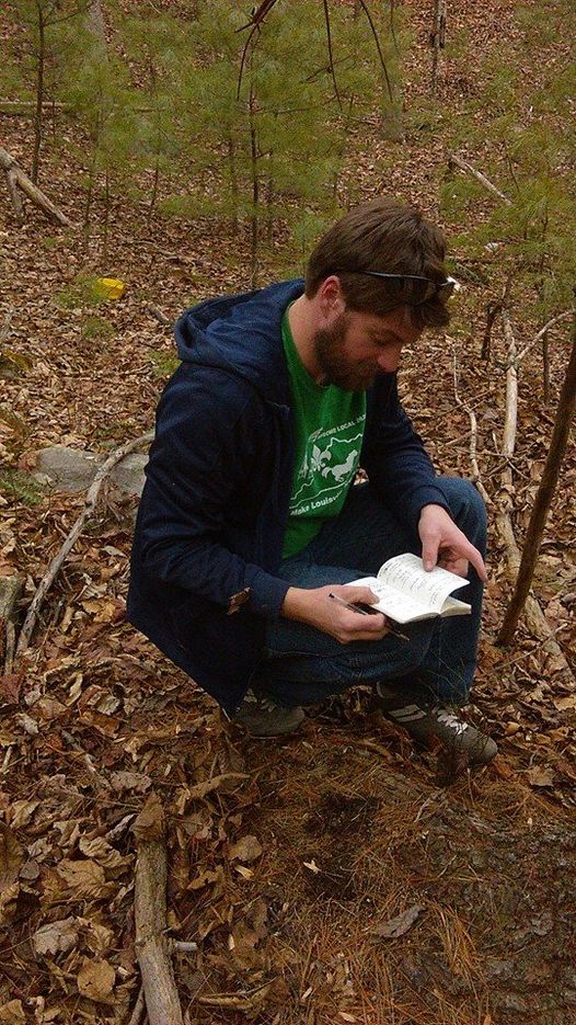 Josh with Book measuring trees